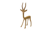 Vintage African bronze gazelle gold weight sculpture with slender horns and green patina.