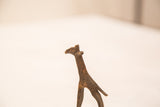 Vintage giraffe bronze sculpture head and neck detail with iron-like patina.