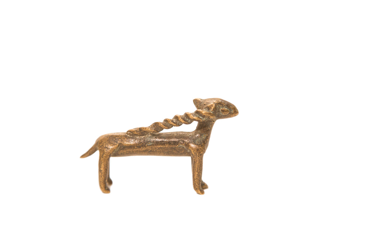 Antique African antelope sculpture, bronze with rich patina, intricate detail, and a broken twisted horn. 3 inches.