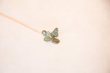 Vintage handmade African fish pendant with deep blue patina and rustic texture.