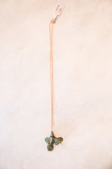 Vintage handmade African fish pendant with distinctive blue oxidized patina.