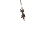 Vintage dark bronze crocodile pendant with a textured patina on a simple necklace chain.