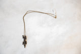 Vintage crocodile pendant necklace with its dark bronze patina and full chain.