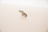 Three-quarter view of a collectible mini bronze hippo showing its aged, rustic patina.