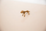 Vintage African golden bronze miniature lion sculpture, distinct handmade form.