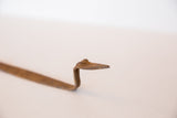 Vintage African iron snake head, showcasing its handmade charm and rustic patina.