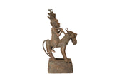 Vintage African copper sculpture of a man on horseback, elaborate headdress, aged patina. 18.5 inches.