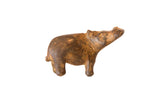 Vintage African bronze hippo sculpture with a heavy, rustic patina.