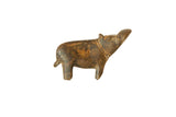 Vintage African bronze turning hippo figurine with a textured, time-worn finish.