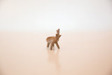 Textured vintage copper elephant with its characterful raised trunk.