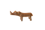 Vintage handmade copper rhino figurine with a textured, time-worn patina.