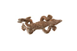Vintage African copper lizard pendant with a textured, cast finish and stylized details.