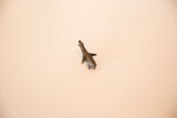 Overhead view of the small, handcrafted African bronze elephant collectible.