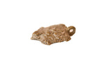 Vintage African bronze turtle pendant with a flower-backed shell and an aged, dusty patina.
