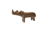 A handmade vintage African rhinoceros figurine cast in dark bronze.