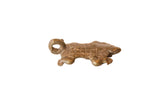 Vintage African bronze turtle pendant with a textured, cast shell and hanging loop.
