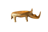 Vintage African handmade bronze rhinoceros sculpture with textured golden patina, 3.5 inches long.