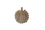 Vintage African bronze gecko medallion with a spiral patterned face and coiled border.