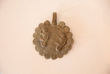 Hand-cast vintage bronze medallion featuring two chameleons and a spiral border.