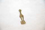 Rear view of the vintage bronze stork, detailing its crowned head and handmade texture.