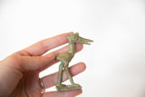 Vintage African bronze crowned stork held to show its petite scale and texture.