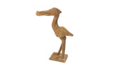 Vintage African bronze stork holding a fish, detailed with incised circular patterns and aged patina.