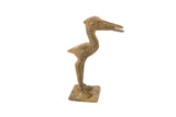 Vintage African bronze stork sculpture with a stylized form and aged, tarnished patina.