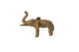 Vintage African bronze elephant figurine with a raised trunk and rustic patina.