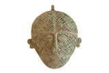 Collectible vintage African copper head, intricate mesh, green patina.
