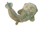 Vintage African copper fish pendant with a green oxidized patina and a stylized heart-shaped tail.