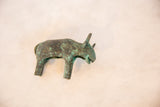 High angle view of the vintage copper bull's handmade form and oxidized patina.