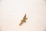 Handmade African bronze crocodile pendant with rich patina and tail loop.