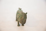 Front detail of the copper wild thing figurine, showcasing its unique patina.