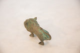 Handmade copper wild thing sculpture, back and tail, with deep green patina.