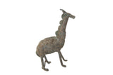 Vintage African chubby giraffe sculpture with a textured, oxidized copper patina and circular patterns.
