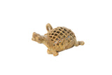 Vintage handmade bronze turtle pendant with an open mesh shell and aged patina.