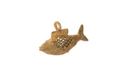 Collectible African bronze fish pendant with mesh design, aged patina, 2 inches.