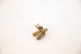 A pair of vintage bronze elephant pendants showing their handmade wire-wrapped texture.