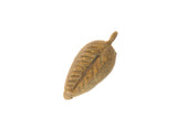 Vintage African bronze bean pod pendant with a textured surface and aged patina.