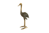 Vintage handmade African bronze ostrich with a dark, textured body and patina.
