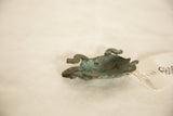 Vintage handmade copper turtle's textured underside with rich green patina.
