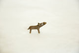 Vintage African bronze hippo showing its simple, stylized form and upward-facing head.