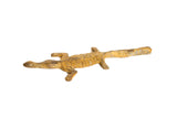 Vintage handmade African bronze crocodile sculpture with a textured, golden patina.