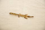 Textured spine and patinated light bronze finish of a vintage African crocodile.