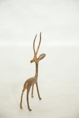 Handmade vintage African copper gazelle head, showing unique textured patina.