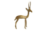 Handmade vintage African bronze gazelle sculpture with rich aged patina.