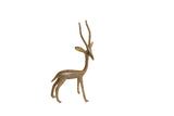 Vintage handmade African bronze gazelle sculpture with a weathered patina, facing right in an alert pose.