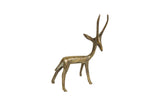 Vintage African bronze sculpture of an alert gazelle with a warm patina, facing right.