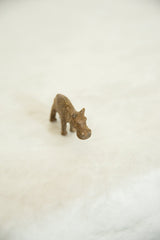 Vintage African bronze hippopotamus sculpture with unique textured brown patina.