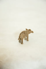 Vintage African bronze hippopotamus sculpture, displaying its handmade texture and aged patina.